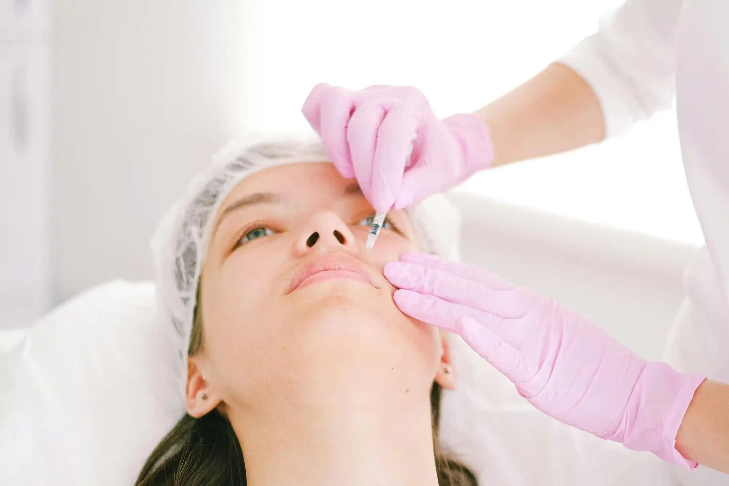 Woman getting dermal fillers