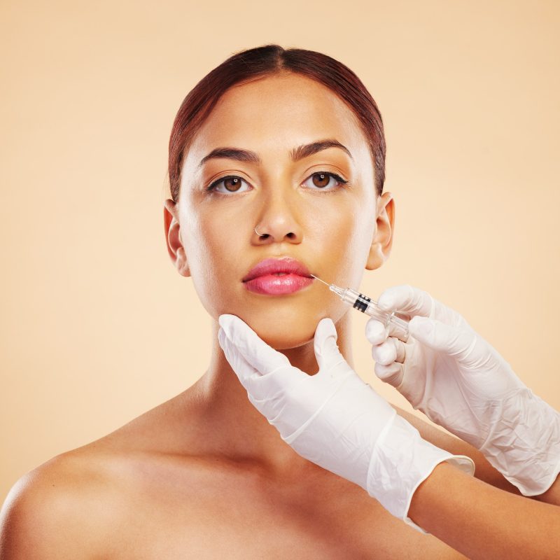 filler-plastic-surgery-and-face-of-woman-with-beauty-treatment-for-isolated-in-brown-studio-backgr.jpg filler-plastic-surgery-and-face-of-woman-with-beauty-treatment-for-isolated-in-brown-studio-backgr.jpg